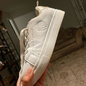 Vince Camuto sneaks